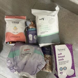 Lansinoh Nursing Pads with White and Green Packaging